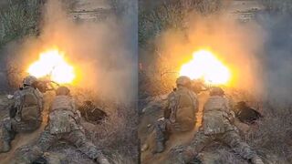Ukrainian soldiers training with a machine gun
