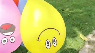 yumna playing with balloons and popping them