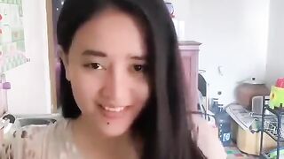 Cooking asian maid