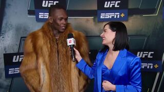 Megan Olivi interviews Israel Adesanya backstage at UFC 281 after losing