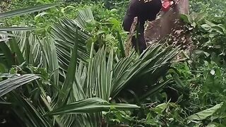 Young man chopping big wood