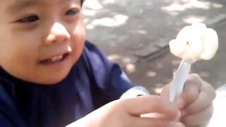 yumna eats an elephant lollipop