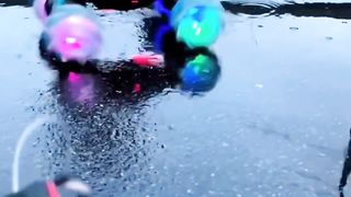 Dancing in the rain and cars