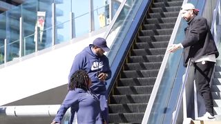 Slipping Strangers Money On The Escalator