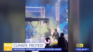 Cameraman attempts to knockout hosts