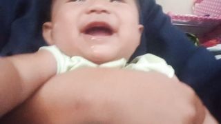 Laughung baby Indonesia with her sister