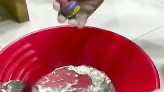 Using red dye to demonstrate that mercury can't be absorbed by a towel...