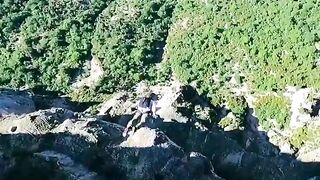 Extreme jump from a cliff.