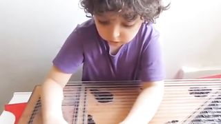 Little boy playing music like piano good