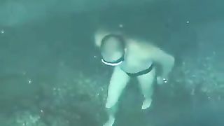 Asian girl walk in water