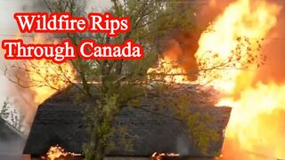 Thousands evacuated as wildfire rips through Canada