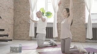 Old man and femal exercise