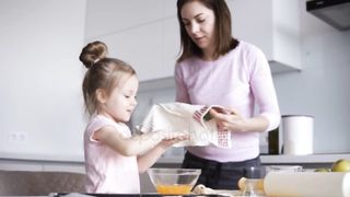 Blondy little girl  cooking