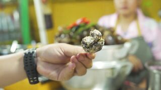 Snails stuffed with meat