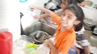 These little siblings were helping their mother