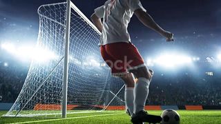 Footbal player score a goal