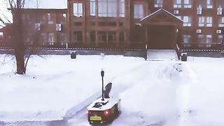 This robot automatically clears the snow in your backyard and driveway.