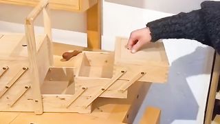 A wonderful box made of wood to carry things folded into three stages????