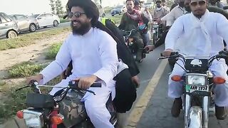 Brother riding a motorcycle in the Long March