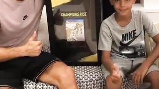 christiano ronaldo along with ronaldo jr