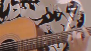 Korean people sing while playing the guitar