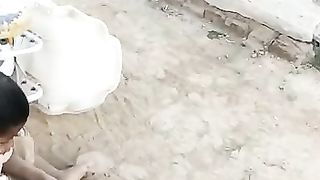 KIDS PLAYING IN MUD