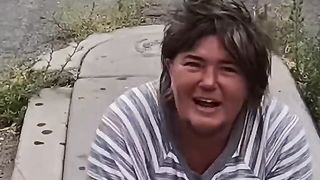 kind man helps a homeless women