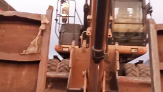 Excavator load on truck