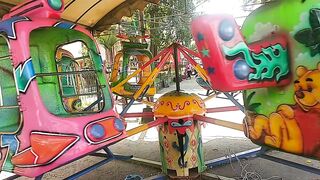 Riding Helicopter Carousel in safari park Blitar east java Indonesia