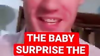 The baby surprise the teacher.he's just chocked.