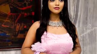 Nira tending doll..