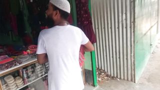 Fother try to buy his son products in a shop.