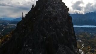 climb to the top of the alaska cliffs