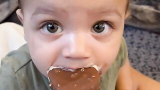 Kid enjoying ice cream bar