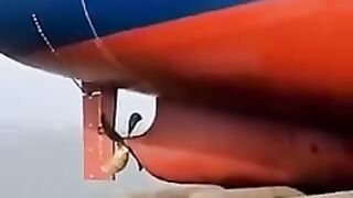 Launch of ships into ocean