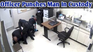 Police officer punching a man in custody