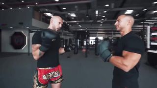 Andrew Tate teaches boxing