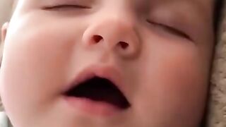 Cute baby say mama with tregic way