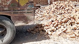 Hardworking people traicktor trali bricks
