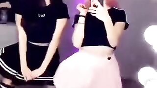 Two girls dance