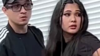 The couple is shocked. The girl lights up.