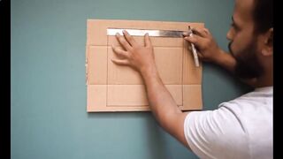 Painter-decorator Mahmud and a piece of cardboard