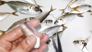 #Food  #fish  treating fish with scissors