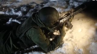Russia's newly-enlisted soldiers fire rifles at night in stealth exercises