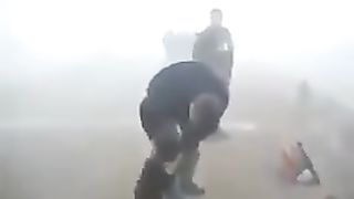 A bear cub that won't leave the rescuers who saved it from a forest fire