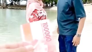 Wife and husband playing waters