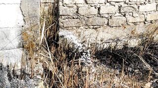 leaking water pvc pipe exposed to grass burning fire