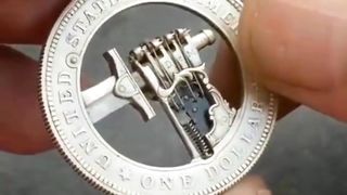 Unusual 1 dollar coin with a secret mechanism
