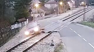 Seconds before the train hit the car hooked on the rails
