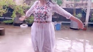 Dancing girl in rain